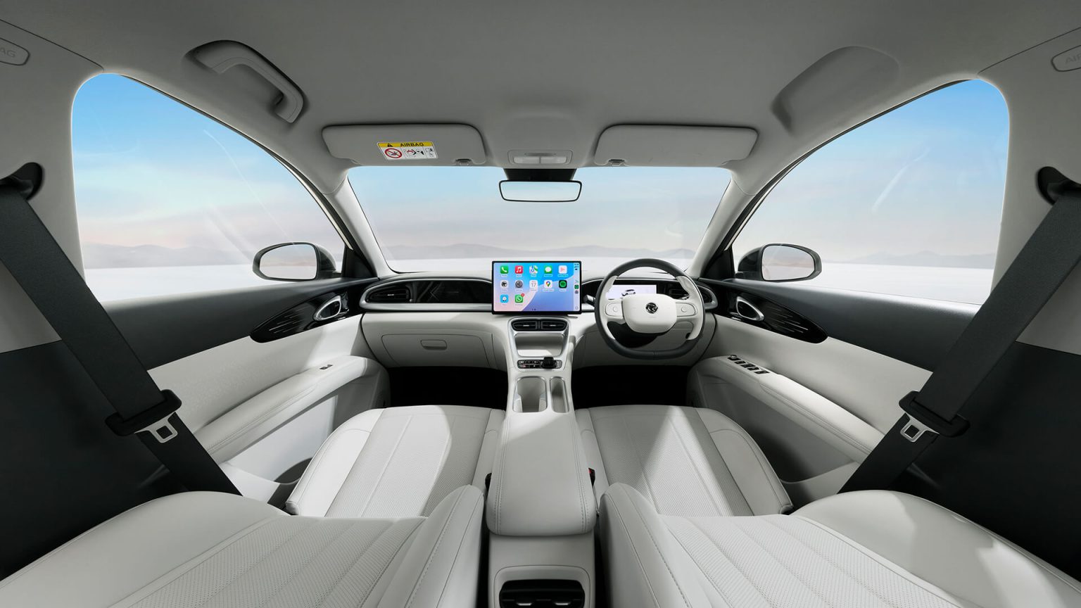 Proton e.MAS 5 Alabaster White interior showing the dual-cowl dashboard and light leatherette seats